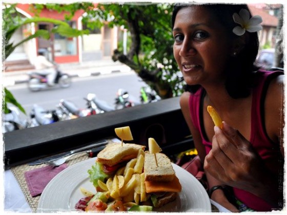 Nomads in Ubud, enjoying a veggie club sandwich (with sweet potatoes, papaya, eggplant and zucchini) and fries sprinkled with herbes provencal