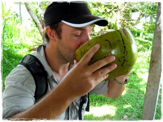 Terry drinking coconut milk, fresh from the tree