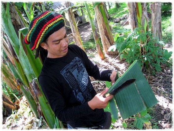 Maade Carving a Banana Leaf